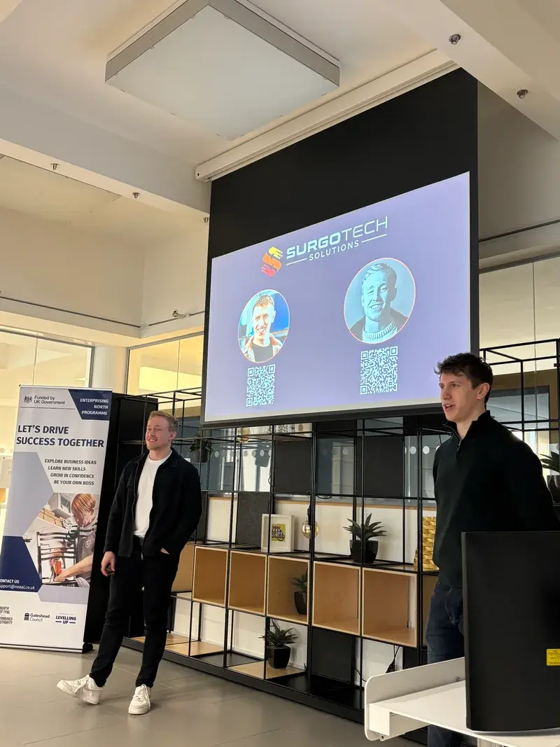 The SurgoTech Solutions team presenting at an event